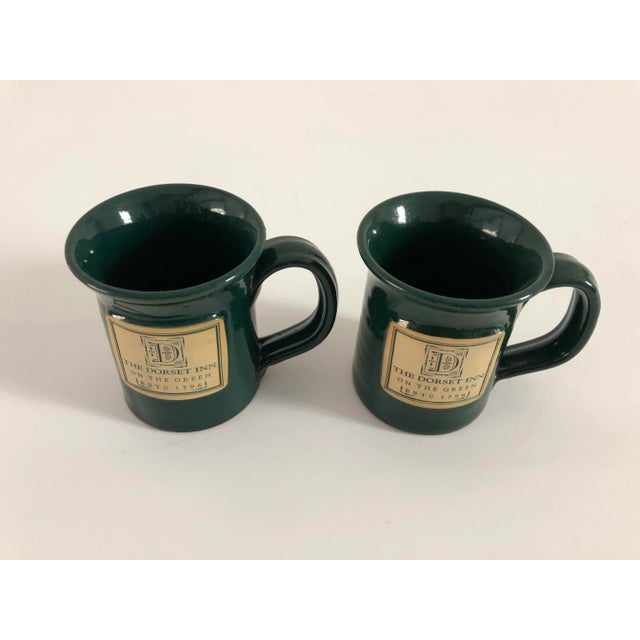 Modern set of two coffee or tea mugs, hunter green with beige made for “The Dorset INN on the green ESTD 1796” Makers mark...