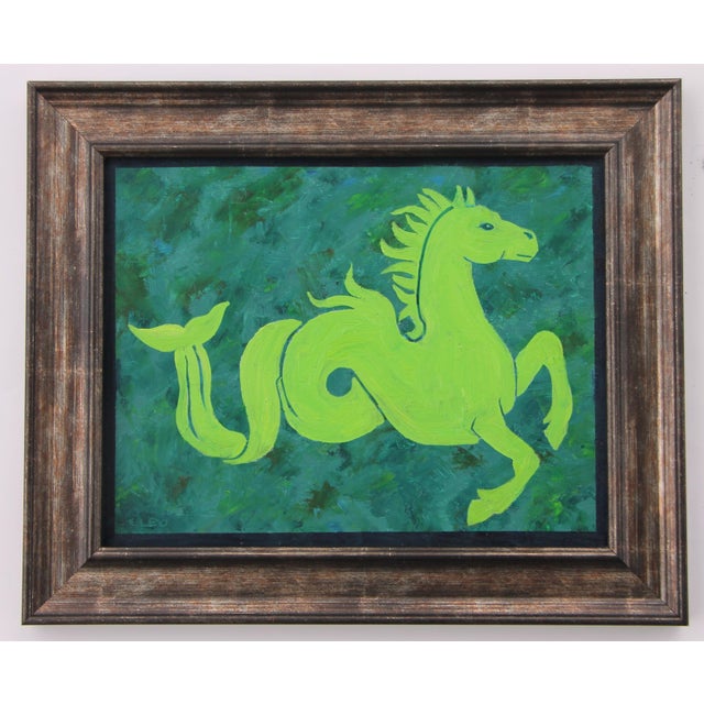 An elegant Sea Horse silhouette from Mythology in shades of army , forest, lime greens with a navy blue border. Abstract ,...