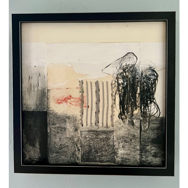 This small work of art is called Antique Story. There's a small piece of cloth collaged on the surface. This came from a...