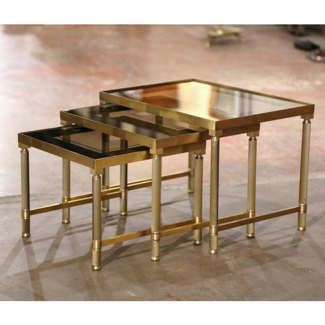 This elegant set of vintage "tables gigognes" (or nesting tables), was created in Paris, France, circa 1960 in the manner...