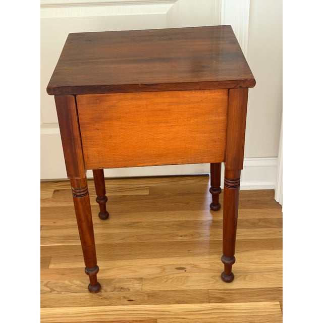 This side table is from the civil war era with original wood screws that attach knobs. I'm not sure but these seem to be...