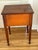 This side table is from the civil war era with original wood screws that attach knobs. I'm not sure but these seem to be...