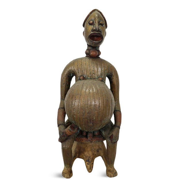 Old Cameroonian male/female fertility figure sculpted in wood and richly clad in hand-applied brass and copper sheeting,...