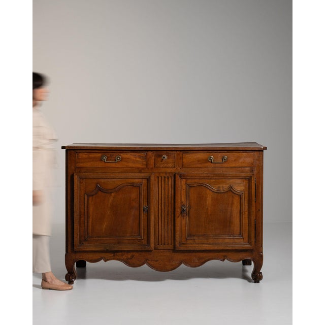This piece presents as a piece, distinguished by medium walnut, drawer. Originating in France during 1800s, it shows the...