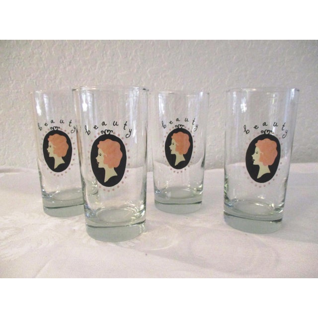 Pretty nicely matched set of 1970s and 1980s highball glasses for the ladies bar. Set consists of four transparent glasses...