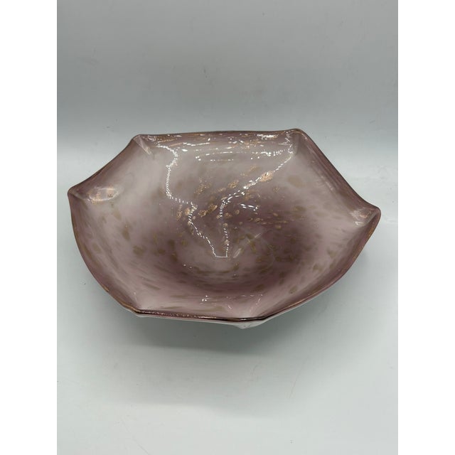 A mid-century Murano glass centerpiece bowl combining soft lavender and milky white glass with abundant gold-toned...