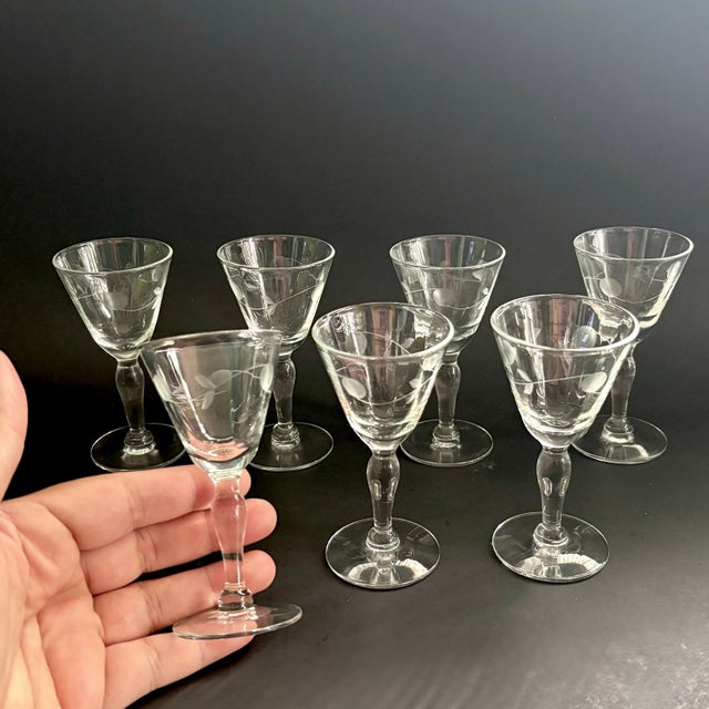 Beautiful set of 7 etched port/cordial glasses. Each glass features delicate frosted etching that wraps around the bowl,...