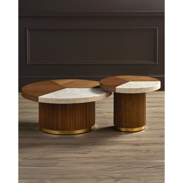 The Dakota Small Cocktail Table has reeded pedestal base made of solid oak with a brass plinth at the bottom. The oak...