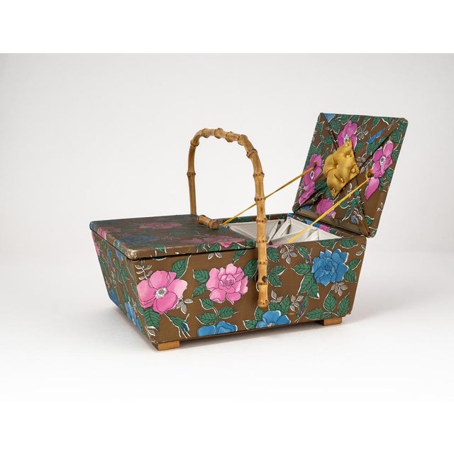 An exceptional piece of contemporary history, this generously sized sewing basket from the 1950s is not only a functional...