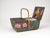 An exceptional piece of contemporary history, this generously sized sewing basket from the 1950s is not only a functional...
