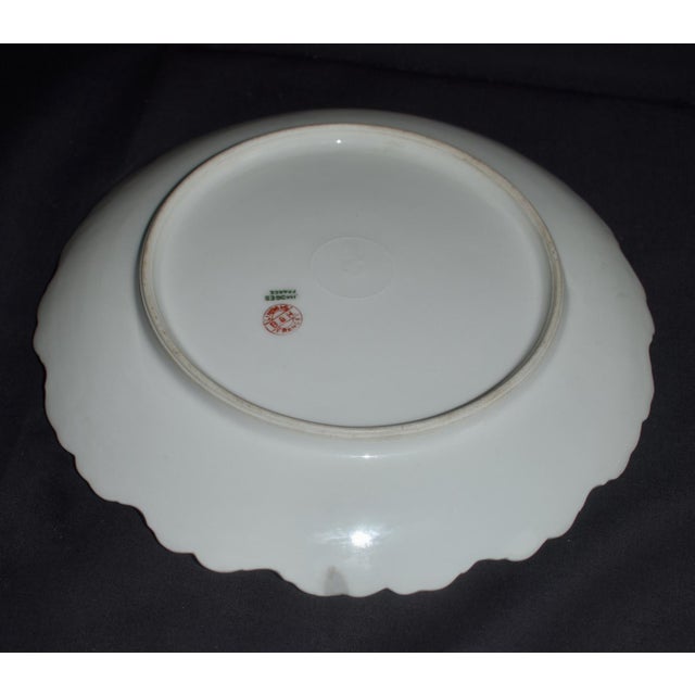 Antique (1910's) Dinner Plate with Floral Designs. Made by Limoges B&H -Blakeman & Henderson. The Material Porcelain....