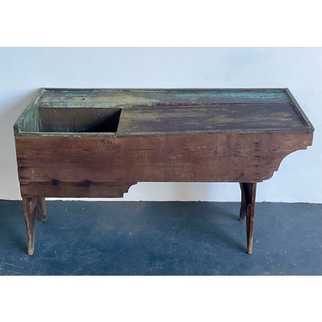 This exceptional primitive dry sink is a soulful testament to early 20th-century utilitarian design, offering a perfect...