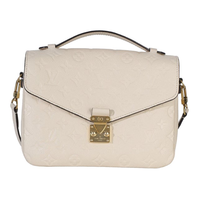 Creme Empreinte Pochette Metis For Sale