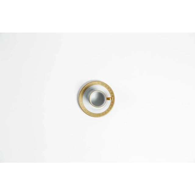 Description: porcelain coffee cup and saucer, set X 2 Collection: White & Gold Signed by Maker