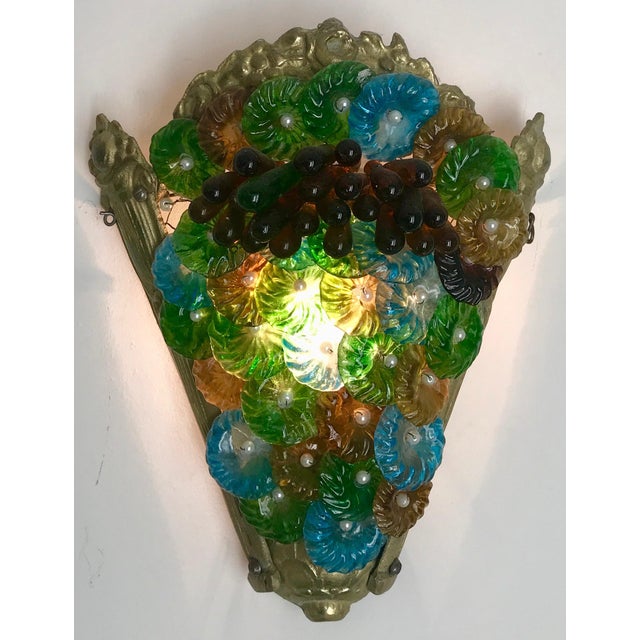 A delightful and colorful Murano glass sconce. This is one of six in my collection and each has its own color story.