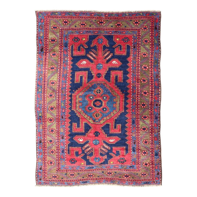 Antique Caucasian Kazak Rug With Bold Geometric Tribal Medallion Design For Sale