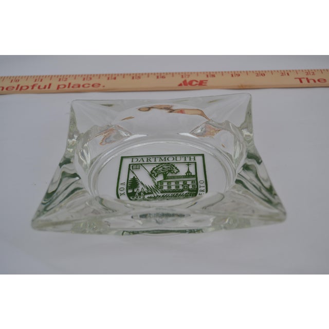 Vintage Mid Century Modern clear glass Dartmouth ashtray. I believe there is a tiny flea bite, as it is called in the...