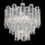 Italian chandelier shown with clear textured Murano glass tubes arranged in multiple tiers, mounted on chrome finish metal...