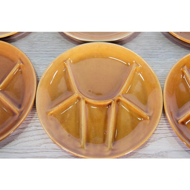 This Set of Ten "Fondue" Cheese Plates by Faience de St. Amand is a charming collection that brings a touch of French...