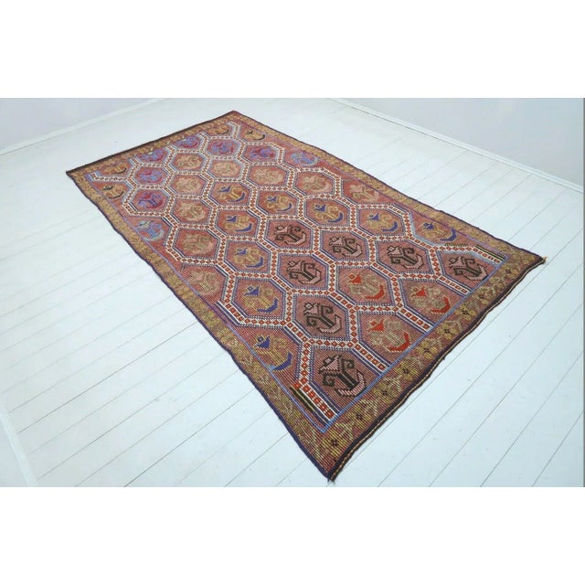 This beautiful, vintage, handwoven kilim is approximately 60 years old. It is handmade of very fine quality wool and...