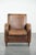 This beautiful sheepskin armchair has a rugged vintage look and comes in a light cognac color. The armchair features a...