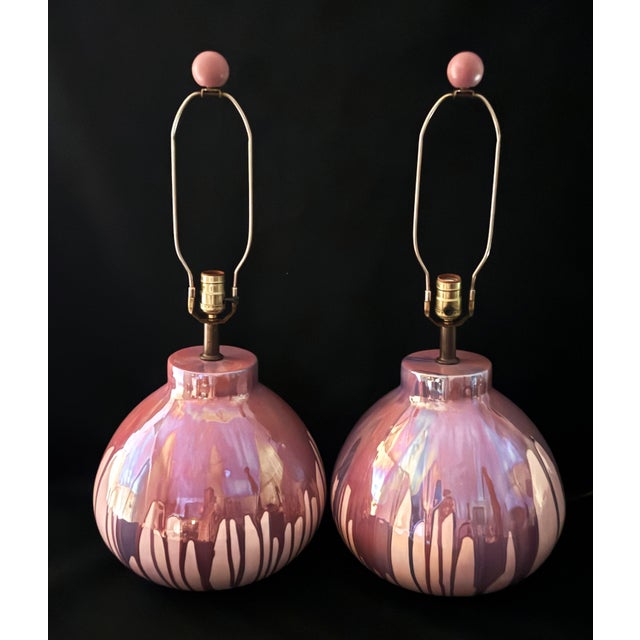 Offered for sale is a stunning pair of vintage mid-century modern lavender and pink iridescent art drip glaze decorative...
