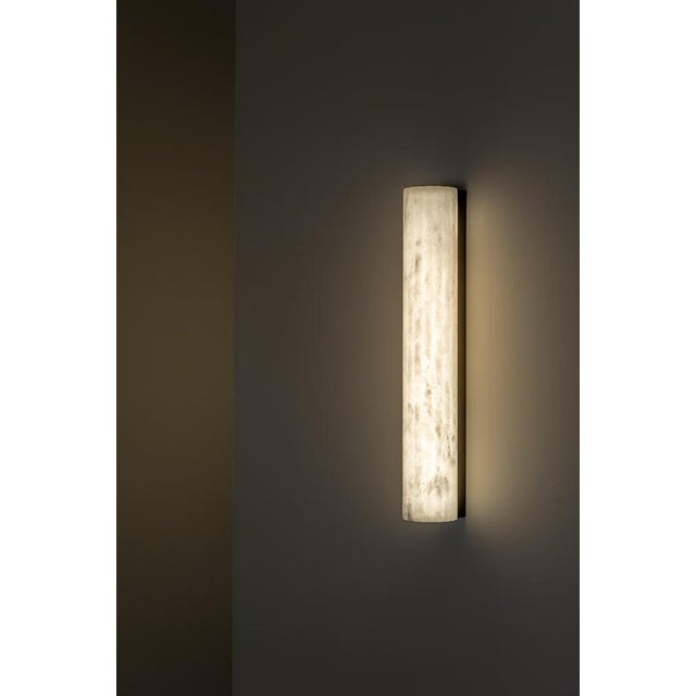 Roller ws small wall lamp by united alabaster dimensions: ⌀ 10 x h 90 cm materials: alabaster, copper (matt black finish)...