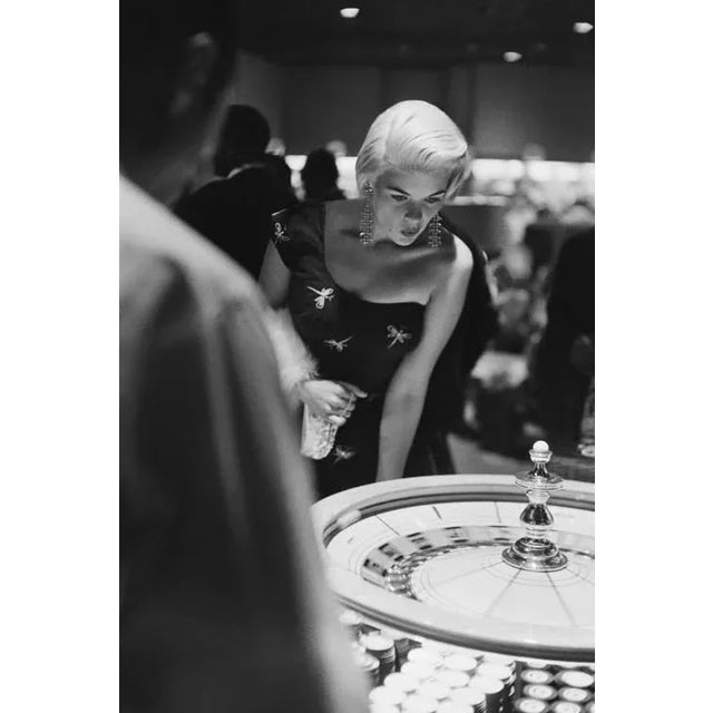 Jayne Mansfield: A Game of Chance This action shot features bombshell star Jayne Mansfield playing roulette in Las Vegas....