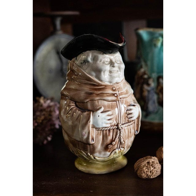 Meet this charming antique & rare barbotine pitcher, crafted by Onnaing in France around the 1890s. Featuring a...