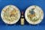 A wonderful pair of large glazed and vitrified ceramic plates, entirely hand-decorated with two different scenes in the...