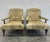 George Smith Edwardian Style Chairs in a muted olive green tone tufted leather on turned mahogany legs with brass casters....