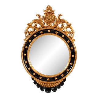 Italian Hand-Carved Oval Wall Mirror With Black and Gold Frame For Sale