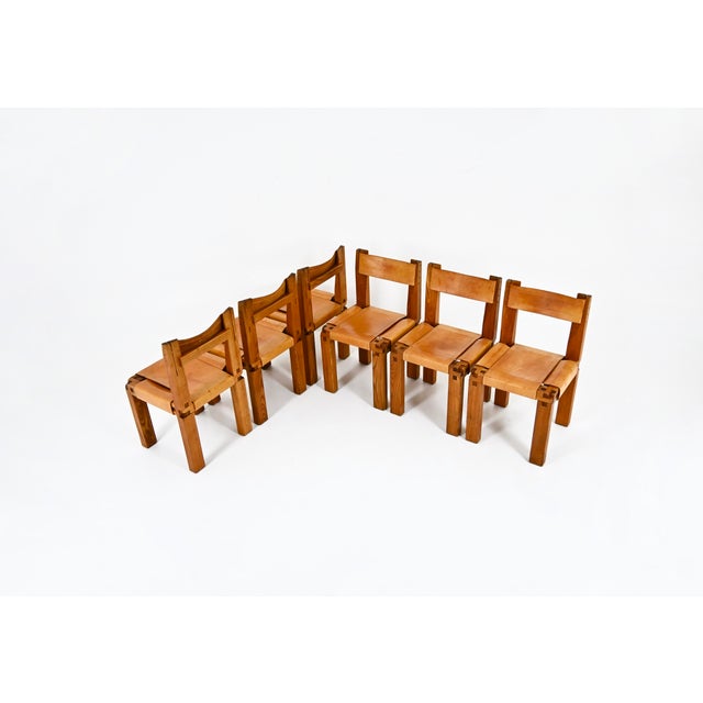 Set of 6 leather and wood chairs by Pierre Chapo. Model: S11. Seat height: 45 cm. Wear consistent with age and time. This...