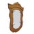 Antique oak, wall-mounted hall tree featuring a shield‑shaped frame and a generously sized beveled mirror. The oak has a...