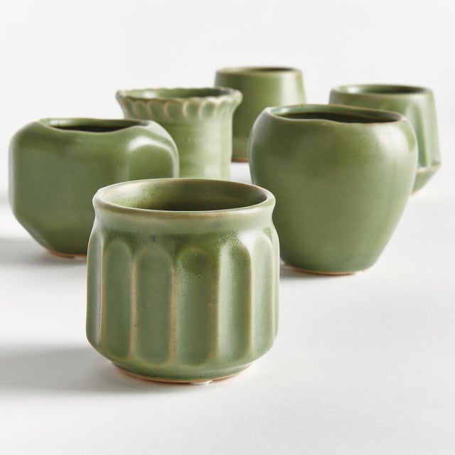 With an eclectic mix of organic forms, this set of six mini pots are simply adorable. What makes them so unique is the...