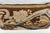 A charming decorative pillow crafted from an exquisite 18th-century tapestry featuring a striking pattern of large,...