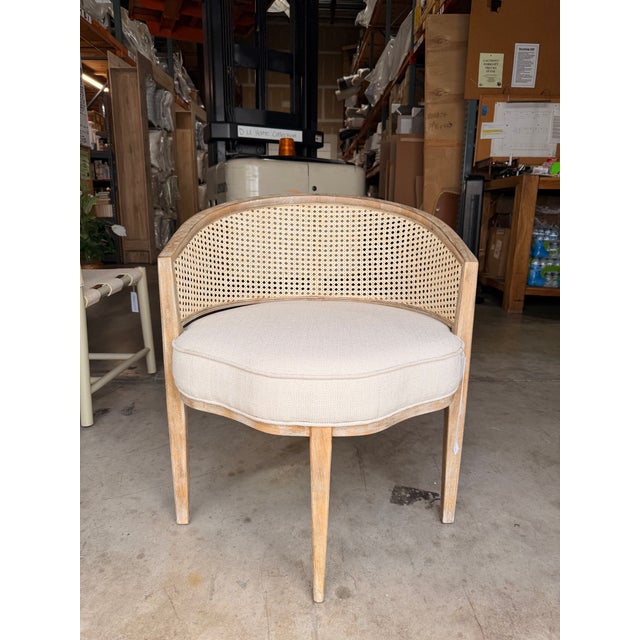 Bring effortless coastal sophistication to your space with this contemporary accent chair, crafted from a beautifully...