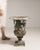 This urn carries genuine presence, its green/black weathered cast iron, campana form on plinth immediately setting the...