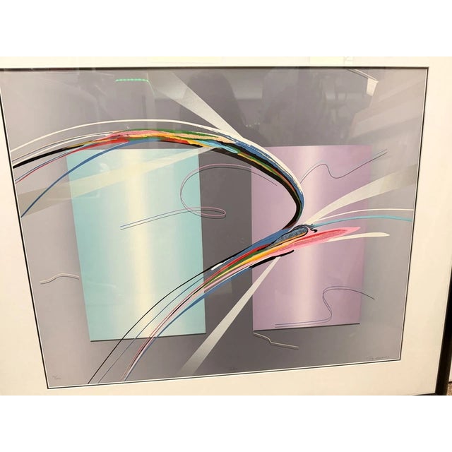 This is a serigraph by Venezuelan artist Elba Alvarez (1944–2005). The artwork features a vibrant abstract design against...