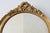 Oval Giltwood Mirror with Rococo-Style Floral Crest, 1950s For Sale - Image 6 of 11
