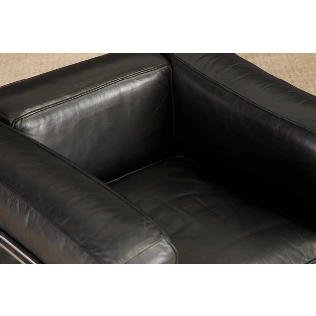This incredibly comfortable early year collectors example of the Le Corbusier for Cassina 'LC2' club chair (authentic...