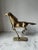 This vintage solid brass running horse figurine in gold color is a collectible piece originating from India. Crafted from...