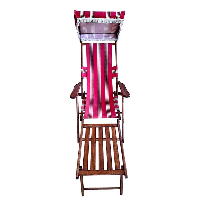 This piece is an exceptional, beautifully preserved example of a Vintage Steamer Chair, commonly known as a Steamer Deck...