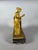 A French Empire period allegory of knowledge clock, circa 1800. Made of mercury-gilt bronze and polished with agate, it...