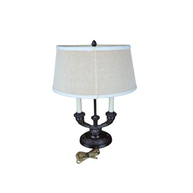 An exceptional vintage dual-light bouillotte table lamp from the celebrated Frederick Cooper of Chicago, model "Trevor",...