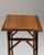 Faux-bamboo side table in Warm Honey Bamboo. Finished in warm honey bamboo, this faux-bamboo side table is distinguished...