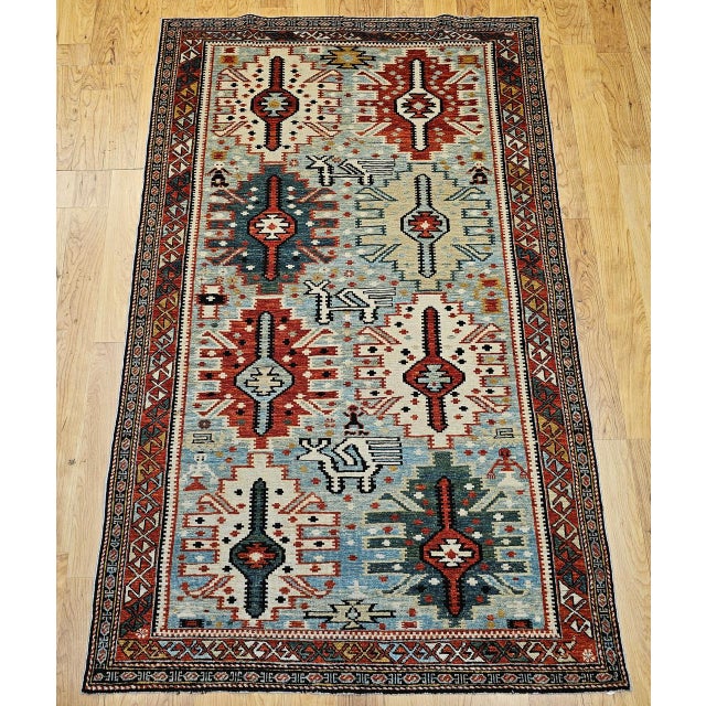 This exceptional early 20th-century Caucasian area rug reflects the celebrated Shirvan design tradition of the Southern...