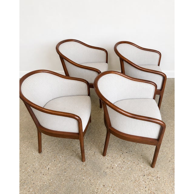 A set of four Ethan Allen "Jacob" barrel chairs — the modern take on the classic tub chair, with a continuous bentwood...