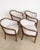 A set of four Ethan Allen "Jacob" barrel chairs — the modern take on the classic tub chair, with a continuous bentwood...
