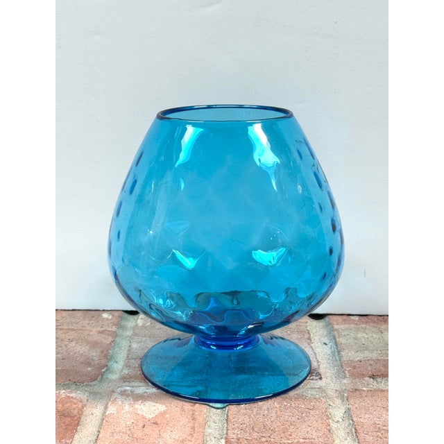 Vintage azure blue glass footed vase with optic pattern from the Empoli region of Italy. Lovely for displaying fresh...